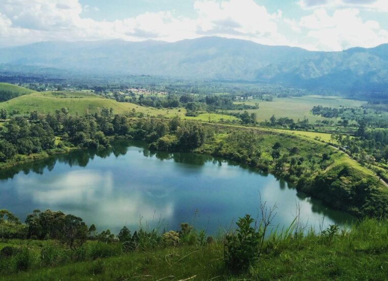 Lush Ugandan crater lake landscape